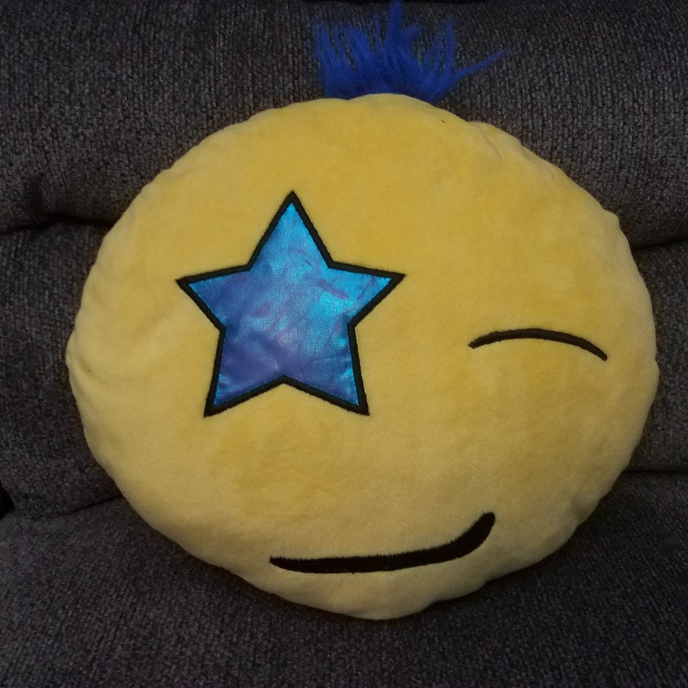 Winking face emoji pillow